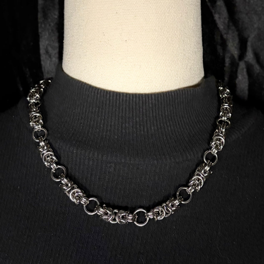 Handmade byzantine weave chainmail Abyzz necklace displayed on a mannequin bust